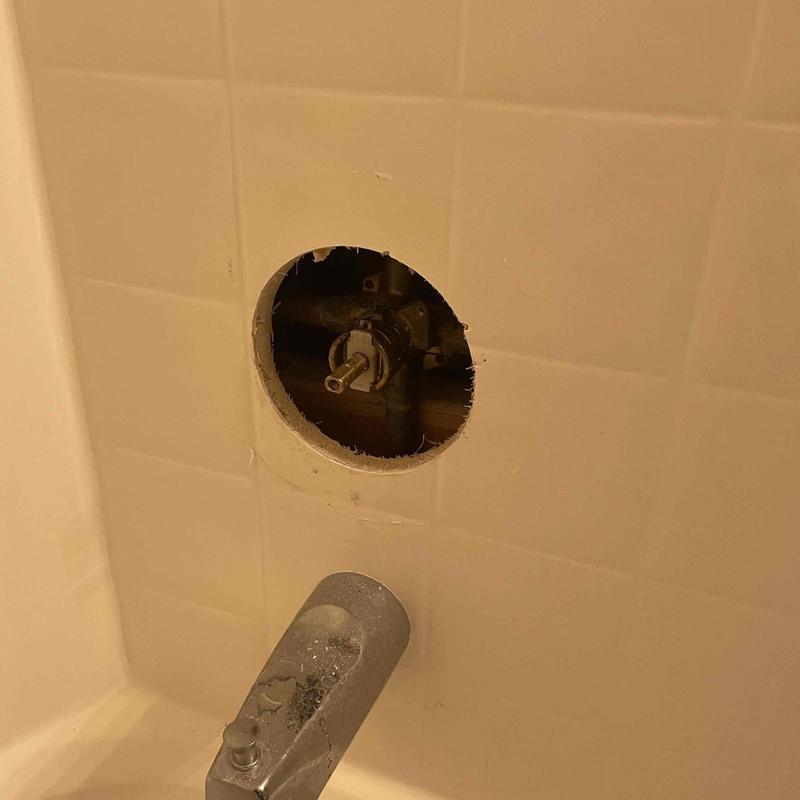 Shower valve cartridge removed for replacement