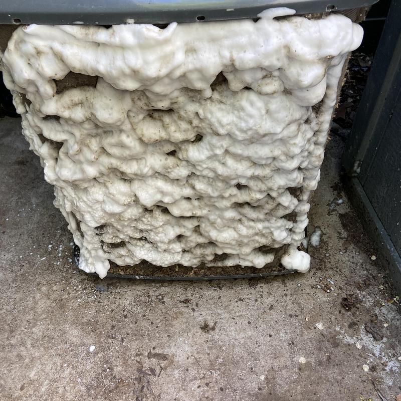 Air conditioner outdoor condenser with foam buildup