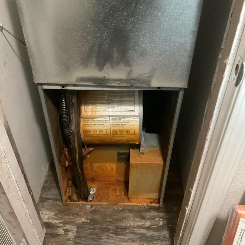Indoor air handler unit with rust and dirt buildup