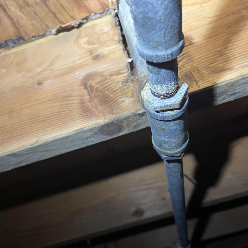Galvanized water pipe corrosion and flow restriction