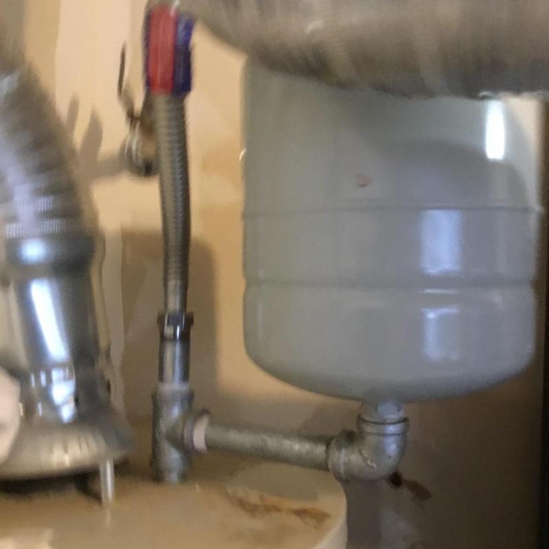 Expansion tank and cold water heater supply piping