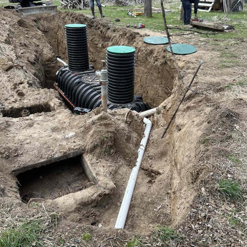 Septic tank and drainfield pipe excavation site