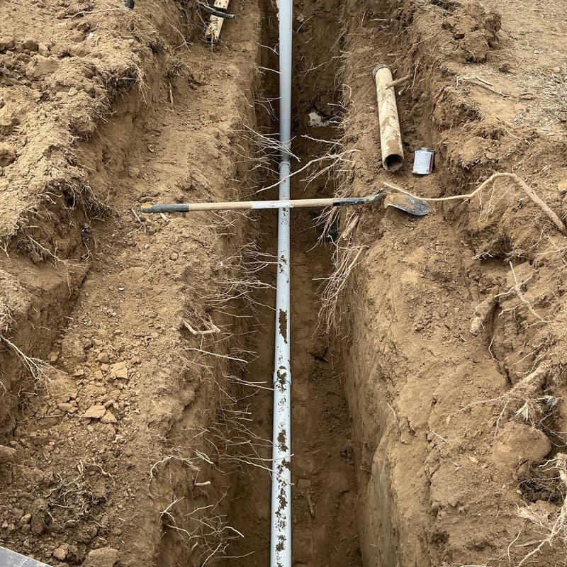 4-inch PVC pipe replacement in trench at 6-foot depth