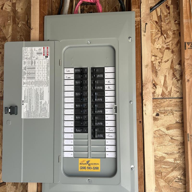 Electrical breaker panel with furnace circuits and AC labels