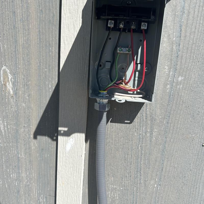 Air conditioning disconnect box wiring and conduit installation