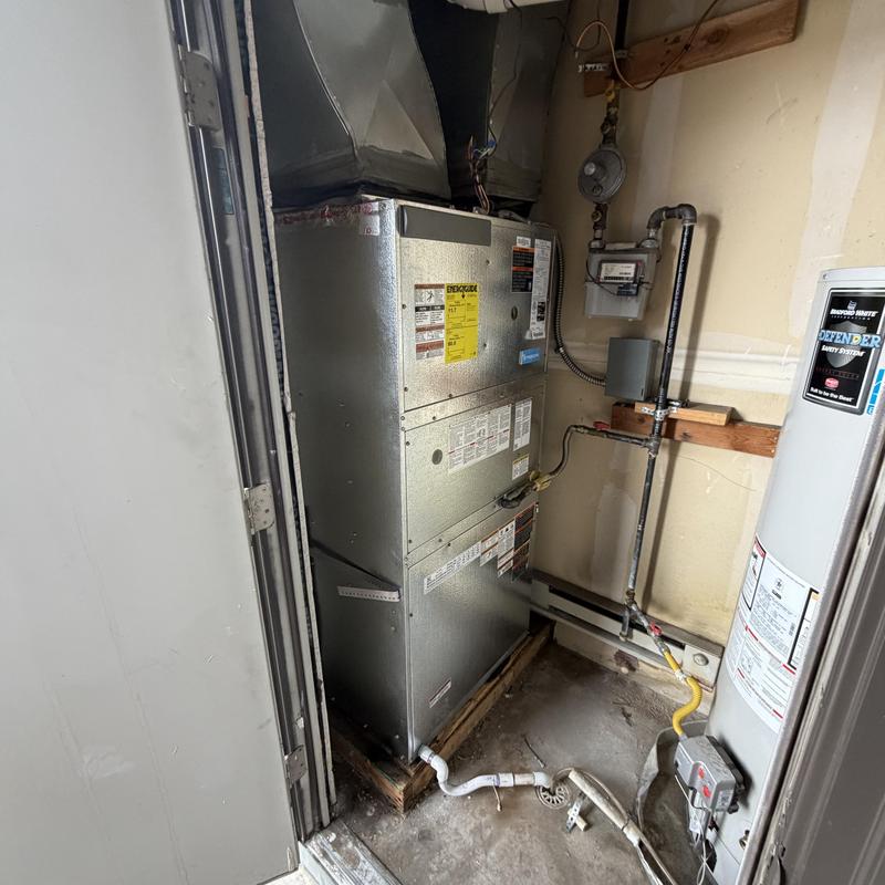 Furnace and ductwork installation in utility closet