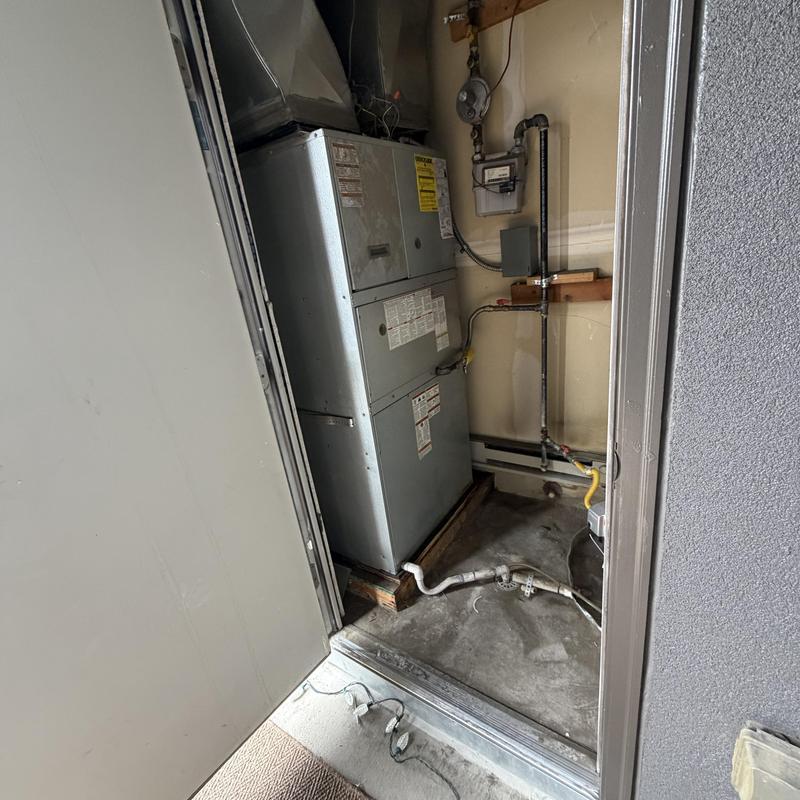 Furnace and air handler unit in apartment closet