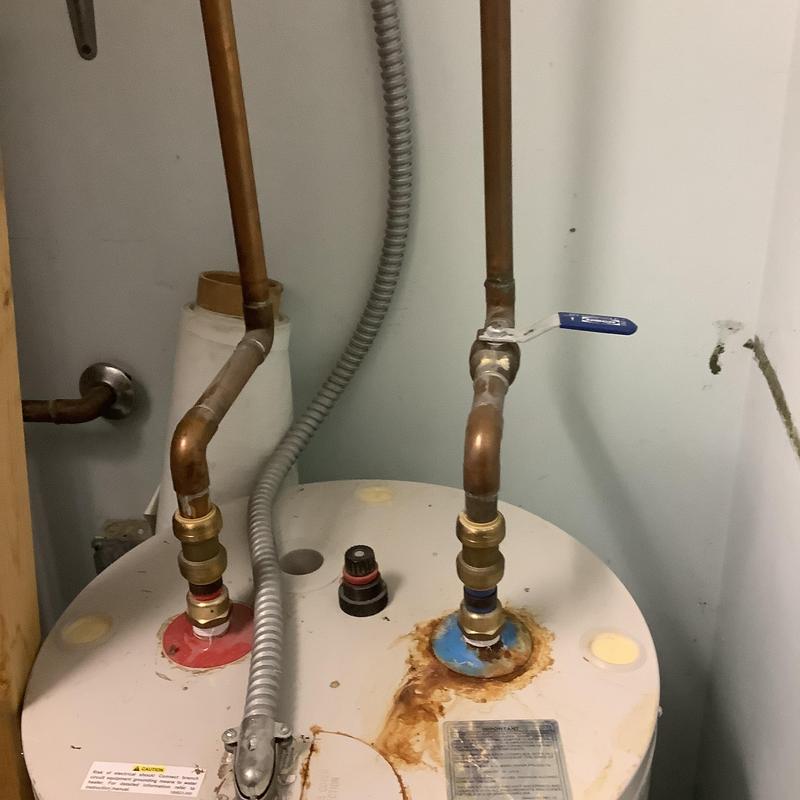 50-gallon electric water heater with copper piping