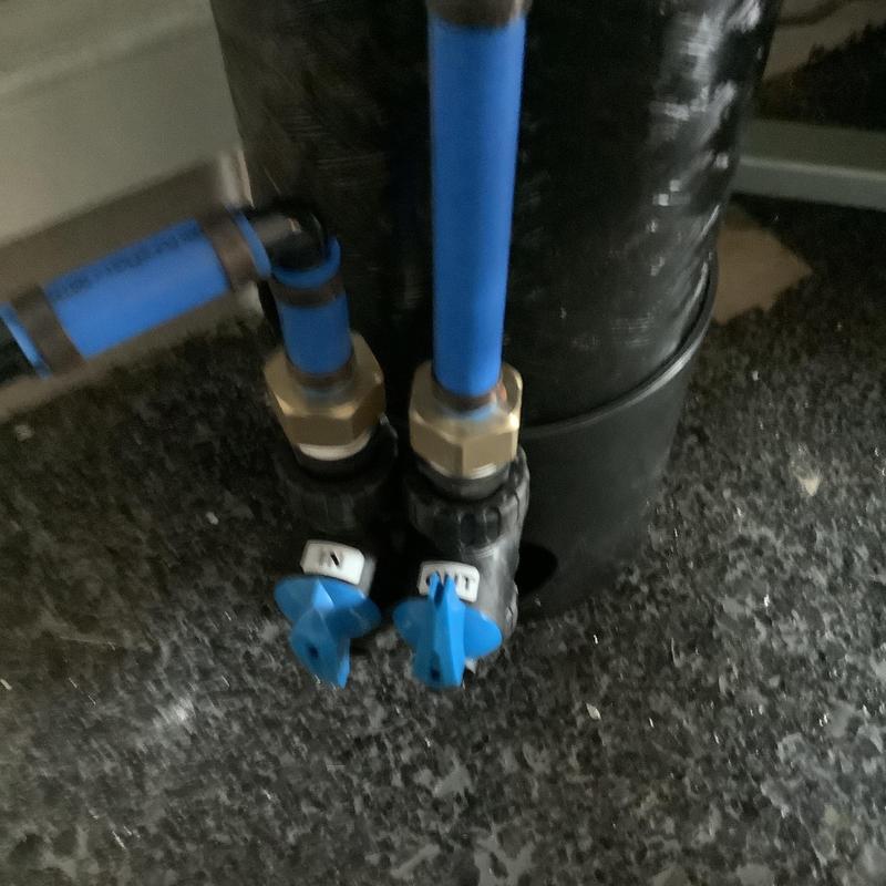 Water heater flush valves with blue piping connections