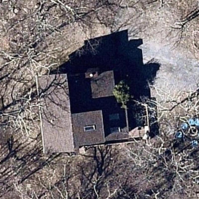 Roof shingles inspection on residential home aerial view Roof shingles inspection on residential home aerial view