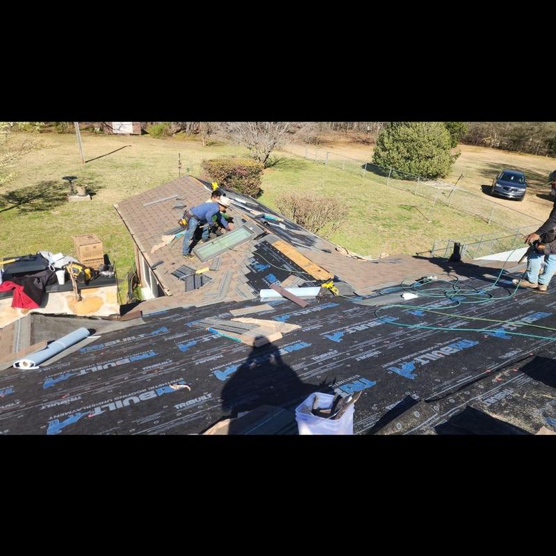 Roof underlayment installation during Spartanburg re-roof job Roof underlayment installation during Spartanburg re-roof job