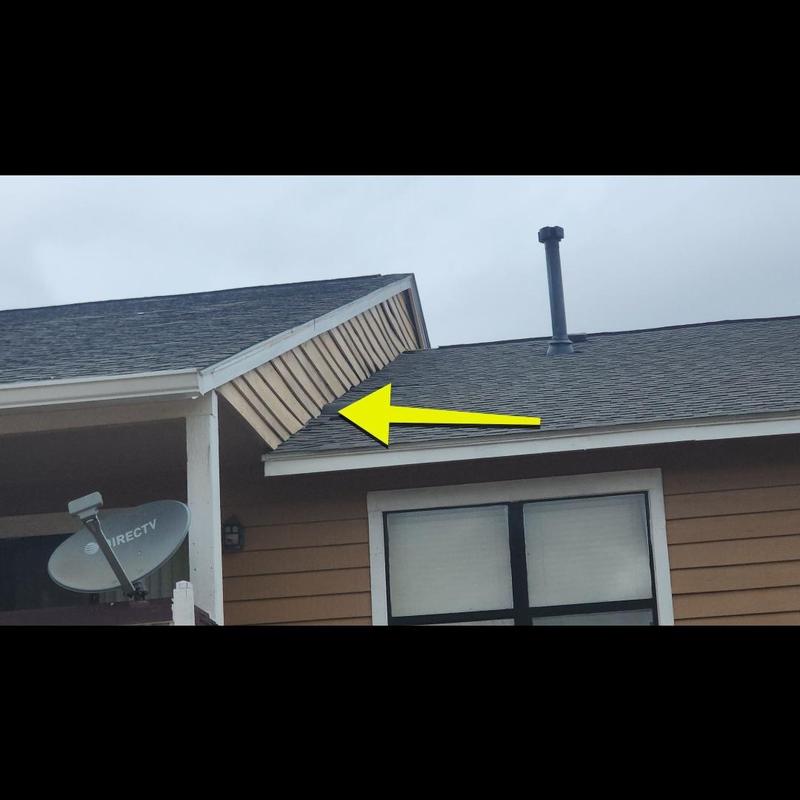 Roof shingles and fascia damage on apartment building Roof shingles and fascia damage on apartment building