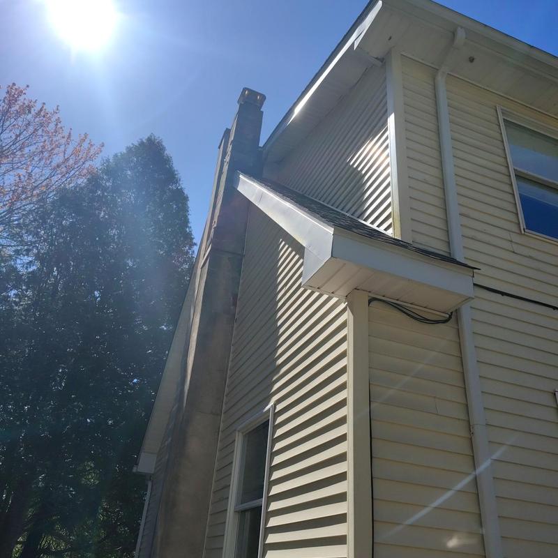 Home siding and gutter system inspection on house exterior Home siding and gutter system inspection on house exterior