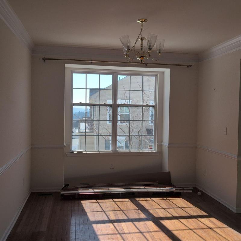 Interior window and walls painting inspection in empty room Interior window and walls painting inspection in empty room