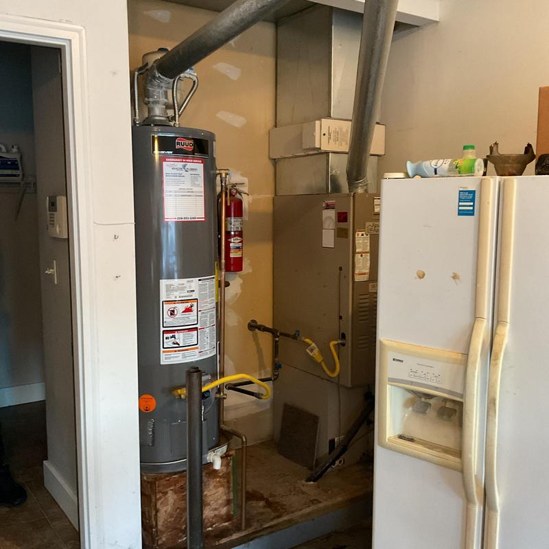 Water heater replacement with vent and gas line