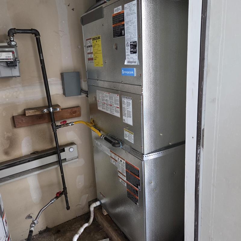 Gas furnace unit with connected piping in utility room