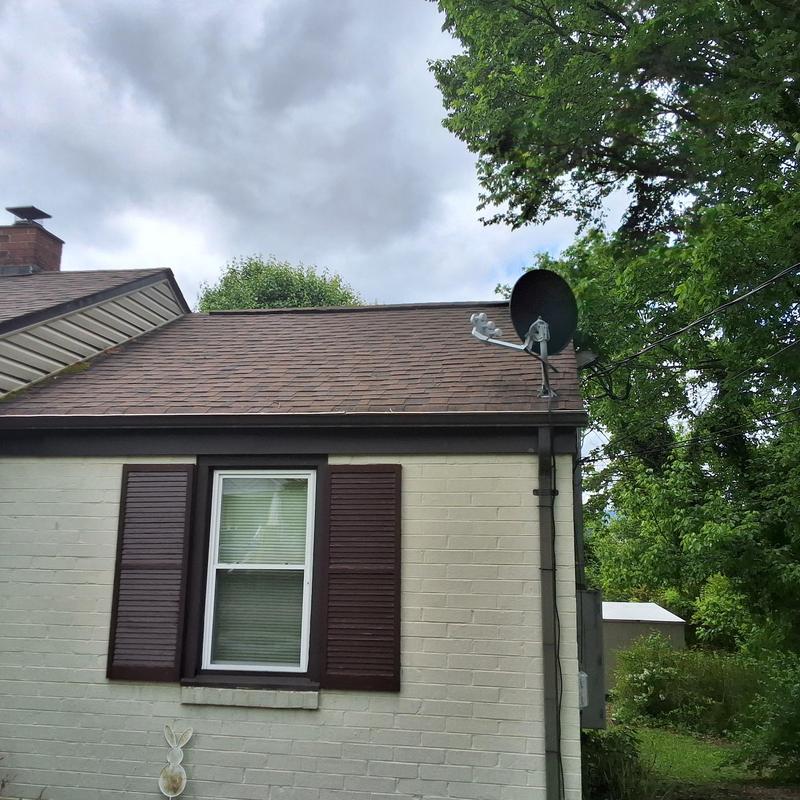 Asphalt shingle roof and satellite dish on duplex Asphalt shingle roof and satellite dish on duplex