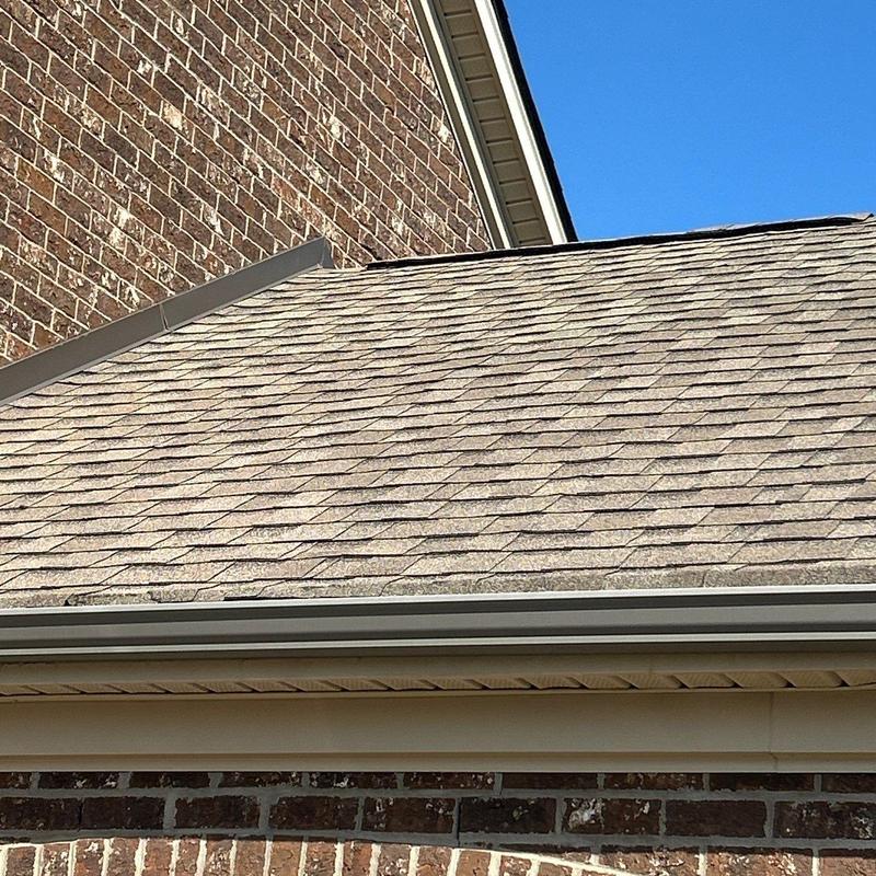 Asphalt shingle roof with hail damage inspection