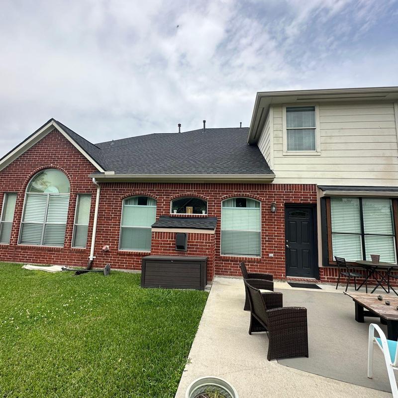 GAF HDZ Timberline Charcoal roof with brick exterior