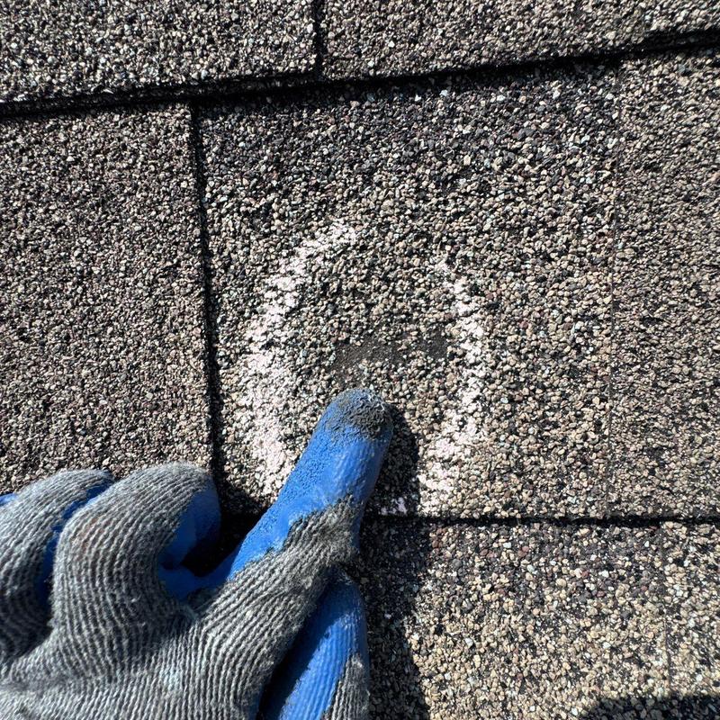 Asphalt shingle hail damage inspection with marked impact area