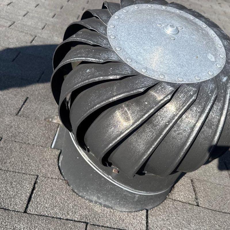 Roof turbine vent with weathered shingles