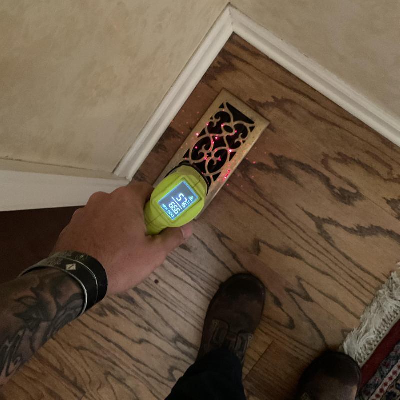 Floor vent temperature check with infrared thermometer
