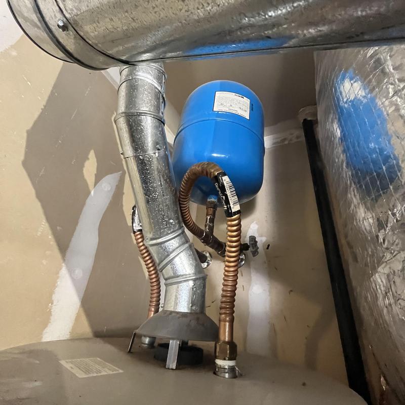 Water heater expansion tank and vent piping installation