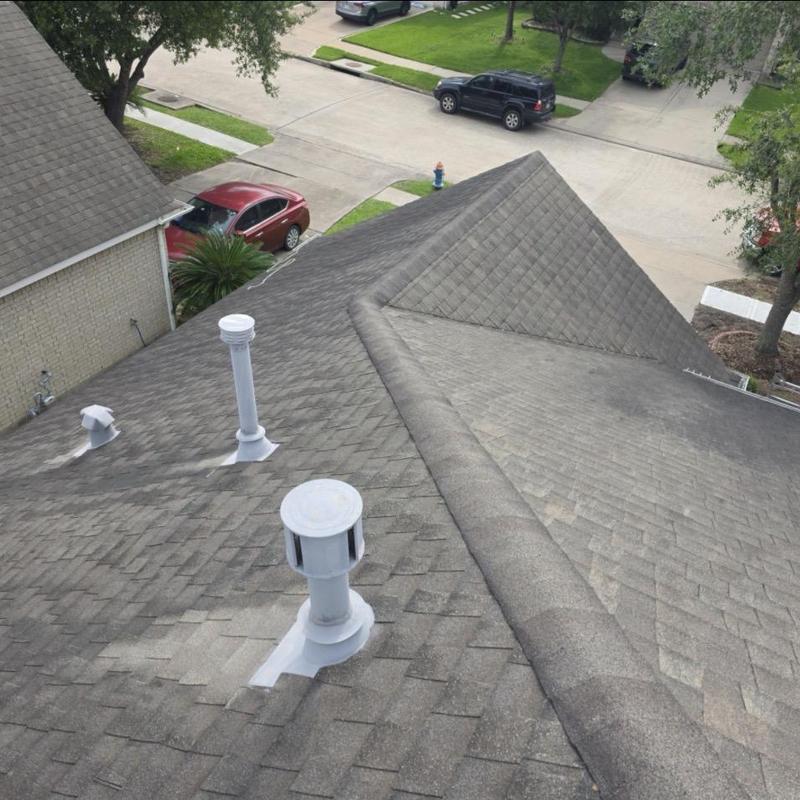 Asphalt shingle roof with vents and flashing inspection