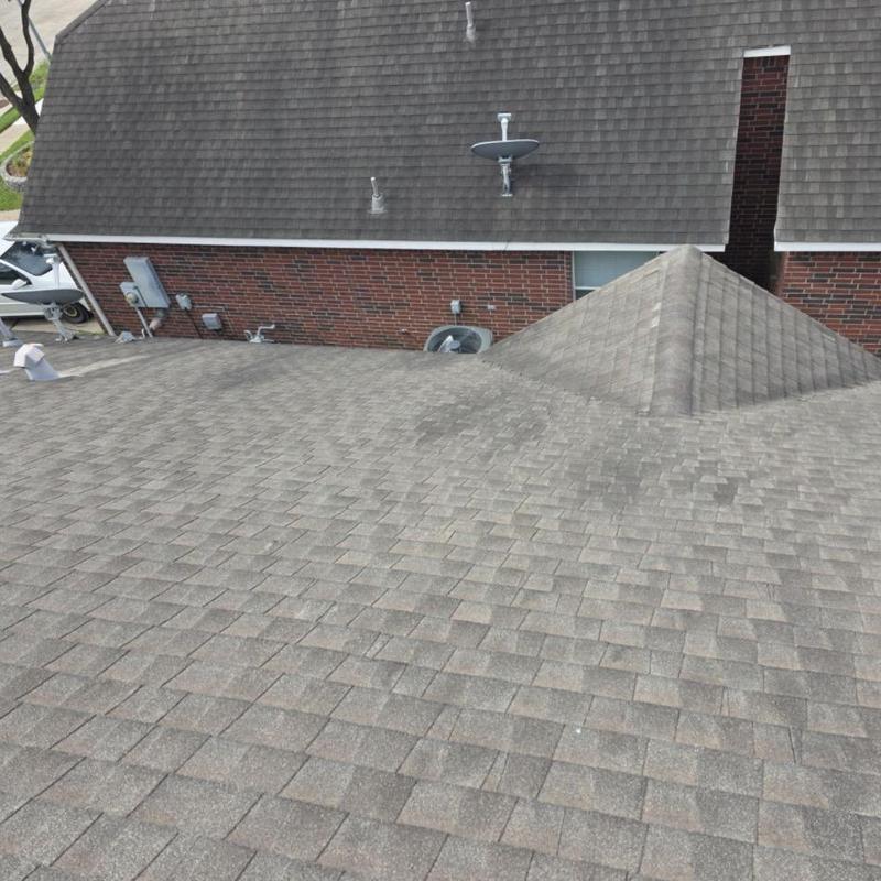 Asphalt shingle roof with vents and satellite dish
