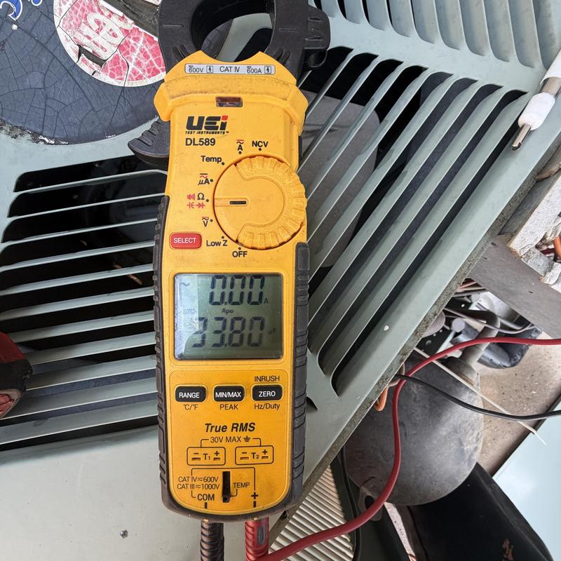 Air conditioner capacitor testing with clamp meter