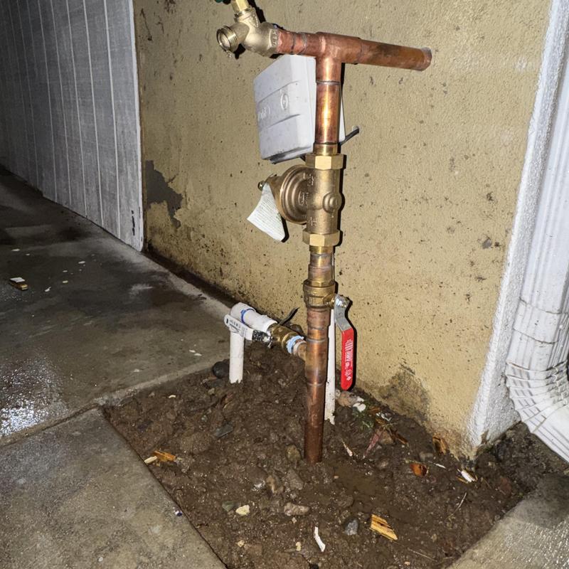 Water main line with shut-off valve and pressure regulator