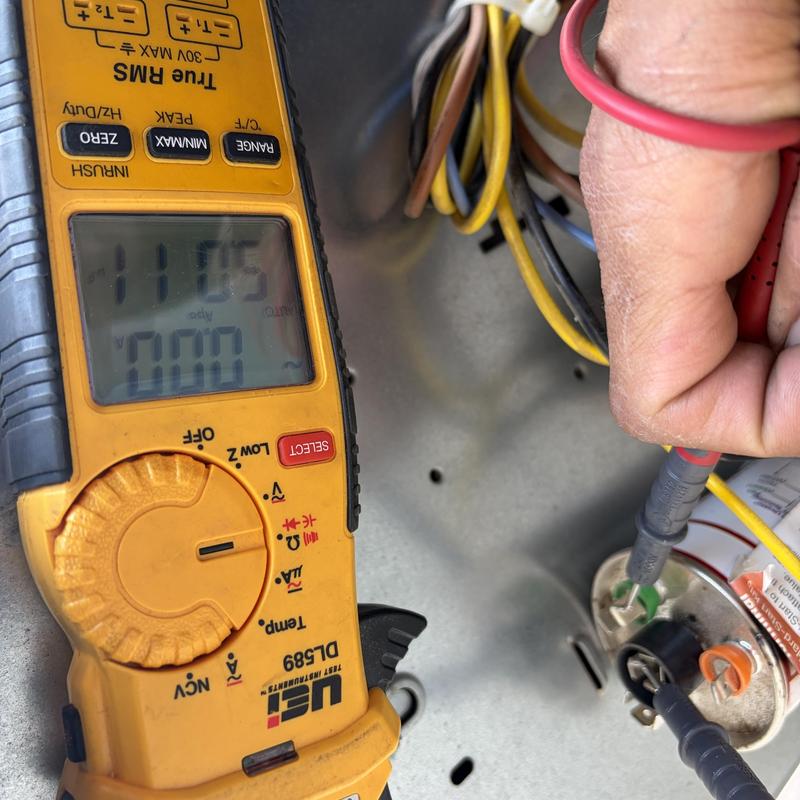 HVAC capacitor testing with digital multimeter and probes