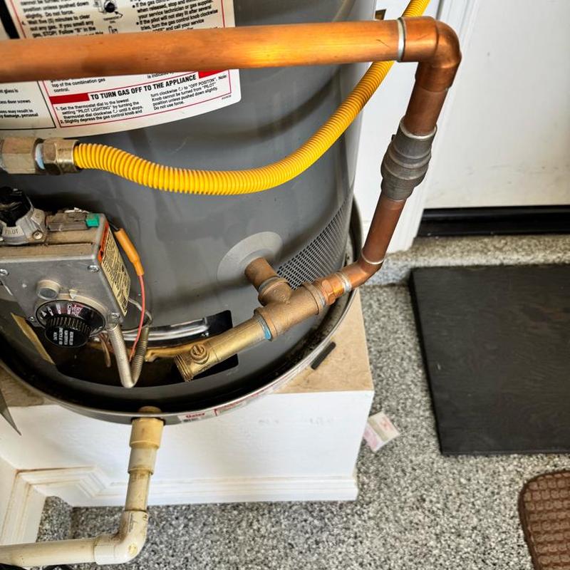 50 gallon gas water heater with new drain pan installation