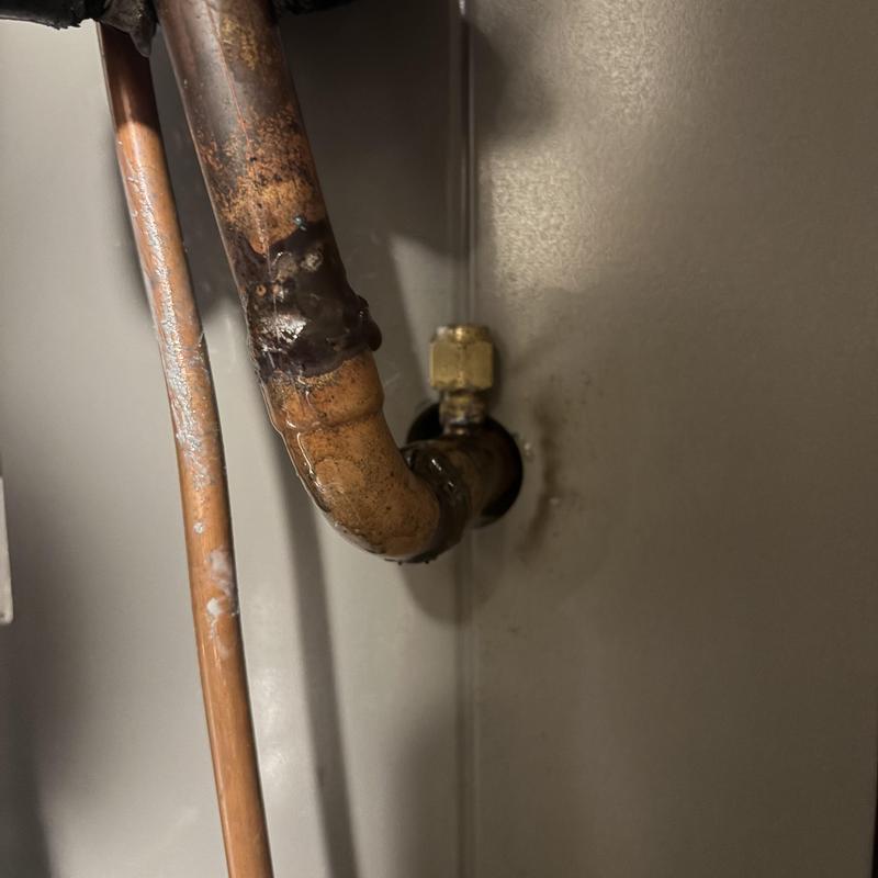 Water heater corroded galvanized pipe fittings detail