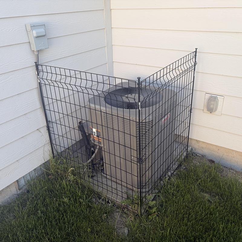 Outdoor air conditioner unit with protective fence
