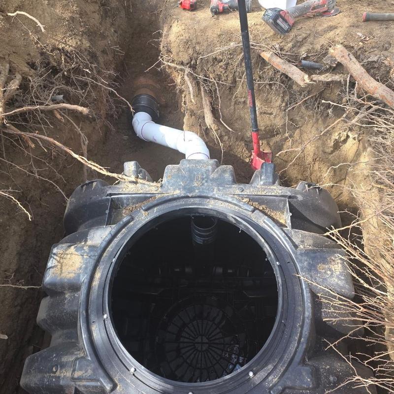 1500-gallon septic tank installation with piping