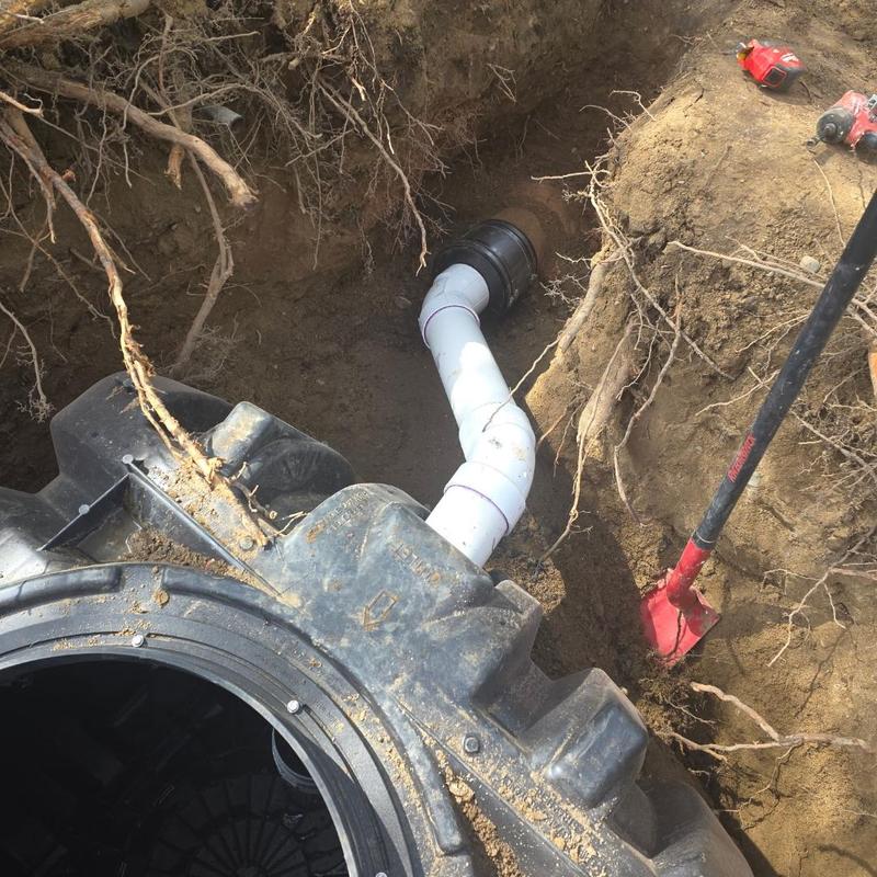 1500-gallon septic tank with PVC pipe installation