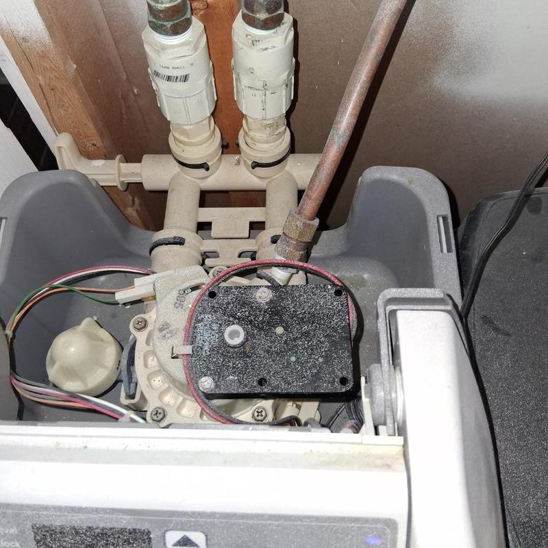 Water softener control valve and piping system