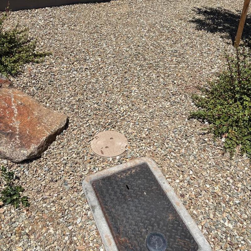 One inch P.R.V. valve with tan access box installed outdoors