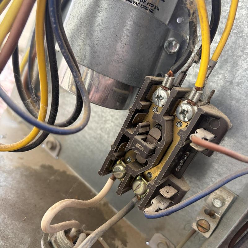 Heating system electrical relay and capacitor installation