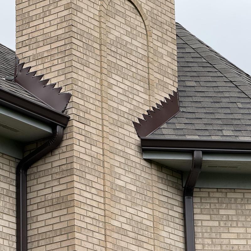 Custom metal chimney flashing on Atlas Class 4 shingle roof
