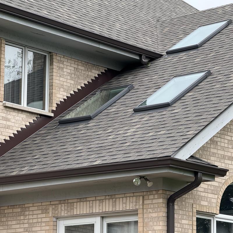 Skylights on Atlas impact-resistant roof with gutter guards