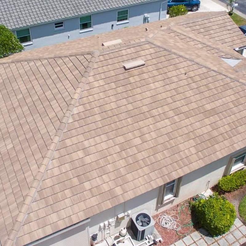 Concrete tile roof with fresh repairs in Fort Myers