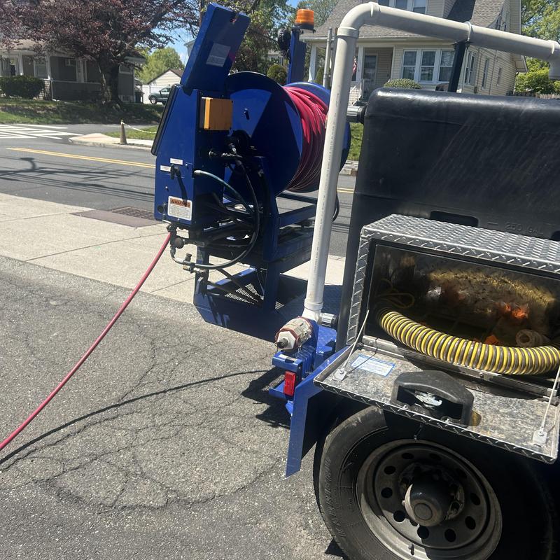 Hydro jet drain cleaning hose and reel setup Hydro jet drain cleaning hose and reel setup