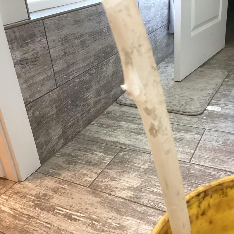 Hot water line pipe with hole near soaker tub floor