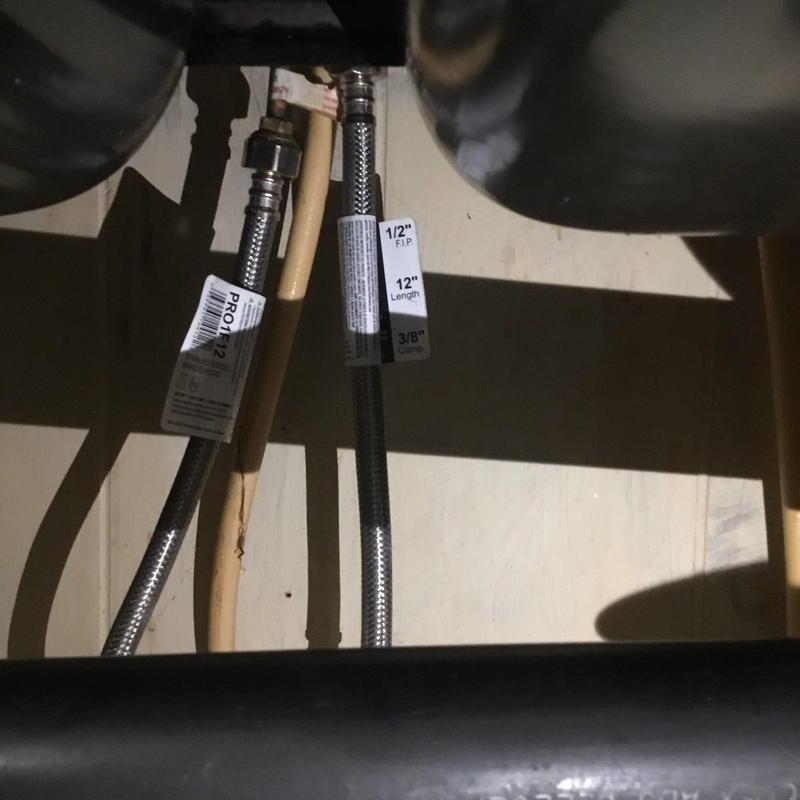 Braided supply lines under sink with copper adaptors