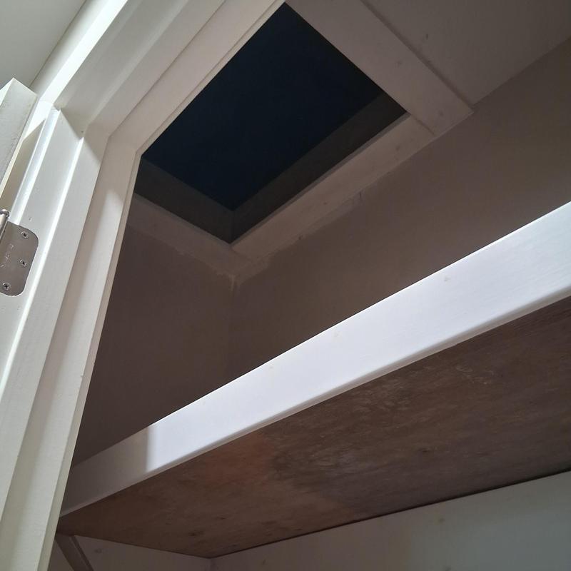 Attic scuttle hole with removable access shelf