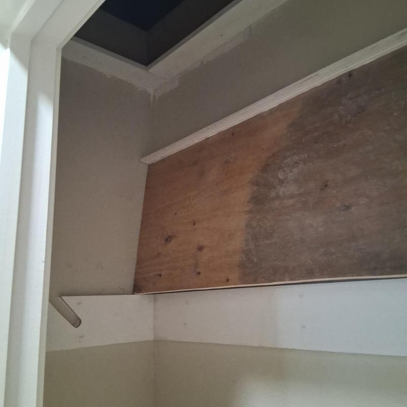 Attic scuttle hole with framed removable shelf installation