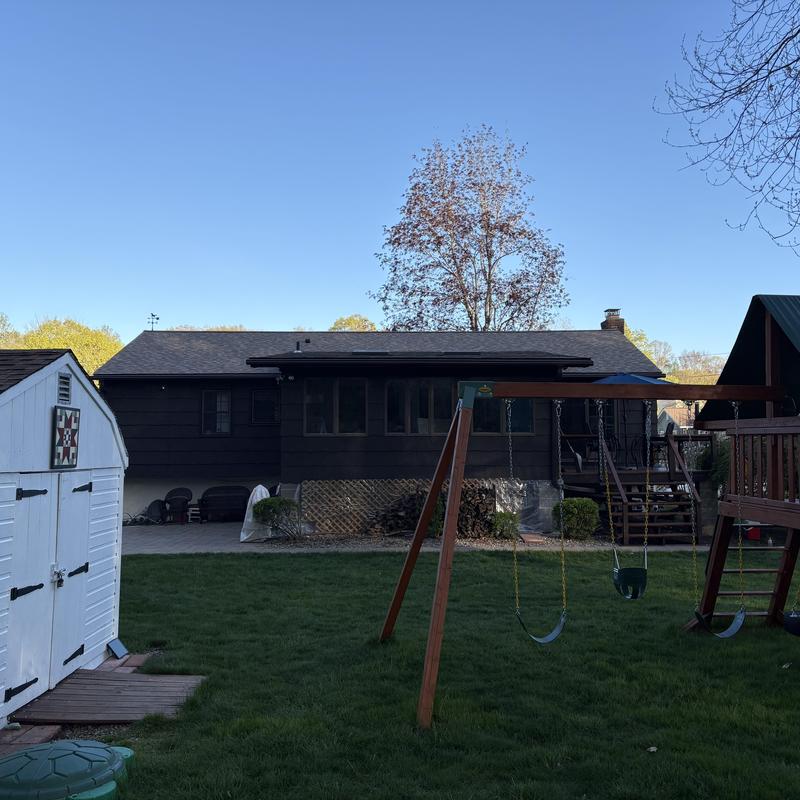 Roof shingles and skylight replacement on house