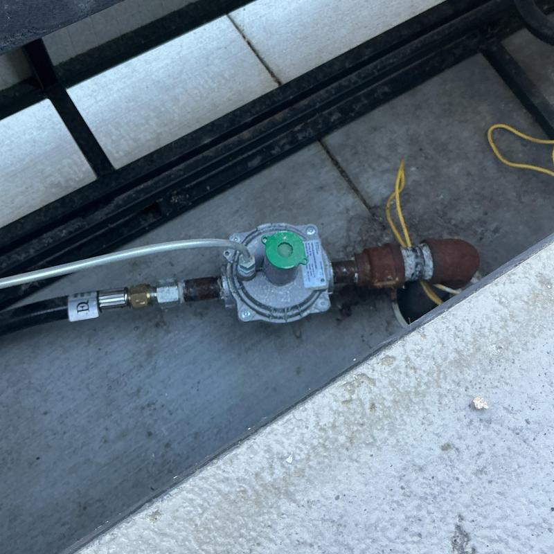 Gas regulator on pool heater gas line installation